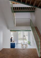 A Mint-Green Staircase Adds Radiant Color to This Restored Townhouse