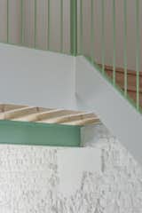 A detail of the mint green stair railing, where old meets new.
