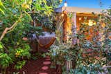 An internationally-renowned landscape designer helped develop and implement a site-level landscape and hardscape plan that epitomizes modern California living.  Photo 9 of 13 in A Midcentury Charmer in the Bay Area Is Listed at $749K