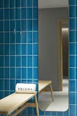 The hotel's spa, with walls tiled in a calming blue tone, uses products from a local company.