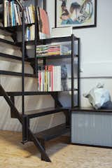 Integrated shelving provides ample storage along one wall.