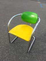 We love the atomic, almost futuristic design of this bright yellow and green armchair from the 1960s.