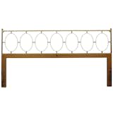As one of the many high-end furniture showrooms in Grand Rapids, Michigan, in the 1950s and 1960s, John Stuart, Inc. sold furniture that ranged in style from early English and French revival to more modern offerings. This king-sized headboard consists of geometric ovals linked together in a rectilinear frame that is at once classic and modern, simple yet glamorous.