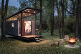 With its open porch with an overhung roof, clerestory windows, and high ceilings, the Roadhaus Wedge RV by Wheelhaus feels much larger and more open than its 250 square feet would suggest.