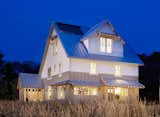 Among the many models that BrightBuilt Homes offers is the Great Diamond, which was inspired in form and materials by the barn and farmhouse vernacular of the local region in Maine. The home was designed to range in size from three bedrooms to five, depending on if the homeowners choose to finish out the third floor loft as an additional bedroom or two.