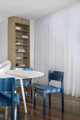 In the dining area, Billiani Design 'Blue' dining chairs from Hub Furniture are a bold but warm shade of blue that provides a welcome moment of contrast from the white walls and dining table.&nbsp;