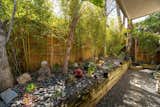 The zen garden, while small, provides a peaceful visual and physical respite from the rest of the home.