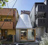 A Concrete Tiny House in Tokyo Opens to the Sky—and the Street