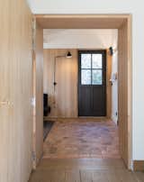 Every detail was considered—from the door hardware to subtle reveals around panels of solid oak.
