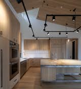 Martha’s Vineyard House by Anmahian Winton Architects kitchen with big island