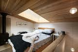 A well-placed skylight directly over the bed in the lofted bedroom is perfect for stargazing and bringing in natural daylight.