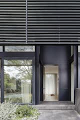 The louvers on the upper level of the home provide both privacy and sun shading.&nbsp;