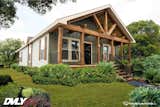 Pensacola, Florida–based Sanders Housing partners with Deer Valley Homebuilders and Mossy Oak to construct their nature-inspired series of four modular homes. This three-bedroom, two-bathroom home has exposed wood beams on the interior and exterior and rustic wood finishes throughout.