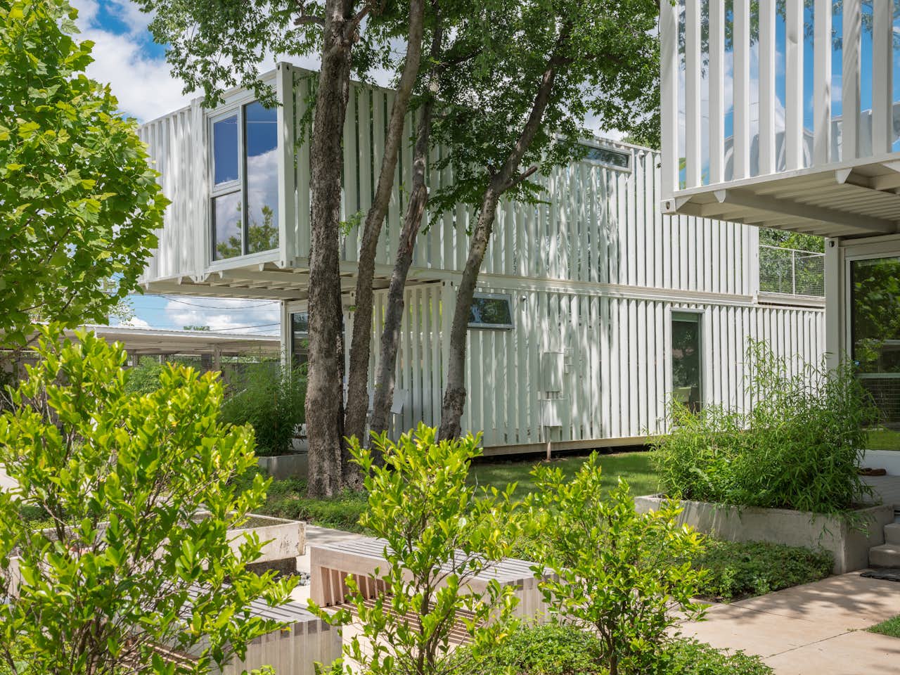 Photo 2 of 11 in A Sustainable Shipping Container Community Springs Up