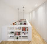 6House by Zooco Estudio bookcase and handrail