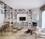 An Ingenious, Multistory Bookshelf Organizes a Sleek Madrid Home