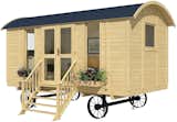The Allwood Mayflower Cabin Kit is available on Amazon and comes with wheels for mobility. A sister model without wheels is also available.
