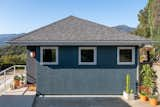 The ADU's painted stucco exterior is consistent with the exterior of the main house, which made getting through the local building department approval easier.