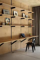 Like all of her projects, the expansion’s design was guided by the principals of simplicity, nature, and functionality; this ethos is reflected in both the layout of the space and in the materials and detailing, including of the wall of modular shelving.