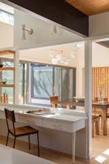Preserving that open layout was a key concept of the renovation. "Specific to midcentury homes, we think it’s important first to embrace their modest size and not try to make them bigger than they want to be: the sense of space achieved by interior flow and openness to the outdoors defines their character," notes Bassett-Dilley.&nbsp;