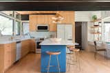 The team eliminated the original front door, making the mudroom/side entry the main entry. This made better use of the small floor plan and allowed the kitchen to expand.