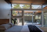 The renovation also reorganized the bedrooms and bathrooms for a more efficient layout.&nbsp;A concrete block "safe room" was added in the bedroom wing for tornado safety.