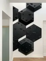 <span style="font-family: Theinhardt, -apple-system, BlinkMacSystemFont, "Segoe UI", Roboto, Oxygen-Sans, Ubuntu, Cantarell, "Helvetica Neue", sans-serif;">Aalap, who had originally suggested the idea of the climbing wall, was equally committed to creating a fun haven for the children. "But he was also inspired to create bold exciting design moments </span><span style="font-family: Theinhardt, -apple-system, BlinkMacSystemFont, "Segoe UI", Roboto, Oxygen-Sans, Ubuntu, Cantarell, "Helvetica Neue", sans-serif;">—</span><span style="font-family: Theinhardt, -apple-system, BlinkMacSystemFont, "Segoe UI", Roboto, Oxygen-Sans, Ubuntu, Cantarell, "Helvetica Neue", sans-serif;"> he wanted the home to be a piece of art,