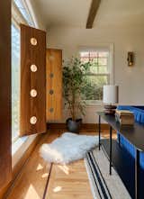 When designing the shutters, privacy was a concern, but so was allowing the right amount of daylight in, especially on rainy, gloomy days. Leader and Sarah liked the way the circular cutouts created balls of light that danced around the room.