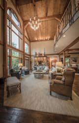 The stunning two story post and beam living room.
