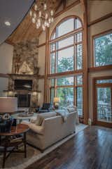 The living room of Meredith House showcases the beauty of post and beam construction.