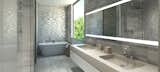Silver travertine master bathrooms feature radiant heating, sculptural free-standing soaking tubs and private commodes.