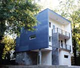 Located in Edgewood, Atlanta, this modern home showcases the use of concrete to add resilience. Designed by Architect Patrick Chopson. Check this home out at 1445 Macklone Street in Edgewood Atlanta.   Photo 5 of 10 in Modern Expression by Sandeep Ahuja
