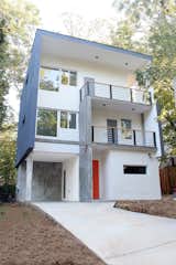 Located in Edgewood, Atlanta, this modern home showcases the use of concrete to add resilience. Designed by Architect Patrick Chopson. Check this home out at 1445 Macklone Street in Edgewood Atlanta.   Photo 8 of 10 in Modern Expression by Sandeep Ahuja