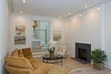 The living room is positioned just off the foyer with two steps down to give it extra interest and to further define the formal space without loosing the open flow of the home. The fireplace surround is accented with shiplap styling and a rich soapstone firebox. The flooring is sustainably harvested white oak grown locally in Connecticut and finished with a zero-VOC finish of beeswax and linseed oil from Rubio Monocoat.