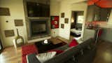 The living room features a dumbwaiter going to roof deck