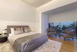 Recessed motorised blinds, customised keypads and smart lighting control in the guest bedroom