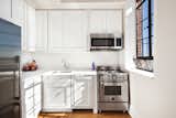 The kitchen offers plenty of cabinet space 