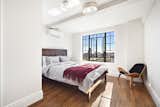 A second bedroom with an equally grand view