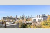 The panoramic view from unit 3 opens onto scenes of Downtown Manhattan and the Brooklyn skyline. $7,595/month.