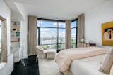 This sumptuous master bedroom suite beckons for lazy mornings 