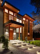 The welcoming exterior front walkway lights up at night