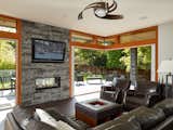 When the doors are open, the warm living room interior flows out into the garden