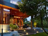Elegant evening view of stunning back corner deck
