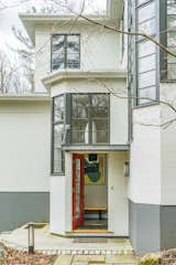New canopy, lighting and entrance door into the house, originally designed in 1939 by Edwin B. Goodell Jr.