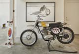 Garage Vignette – The sparse, industrial material palette creates the backdrop for display of the Owner’s collections of bikes, skateboards, windsurfing gear, and artwork.