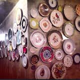 The wall of plates at the TV room is growing in numbers