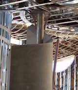 Stainless steel column will be polished and textured, its functional too as it supports a large part of the upper floor.