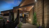 Modern Custom Home in Paradise Valley, Arizona designed by SpaceLineDesign Architects.
This 7,300 sf contemporary home is cut into the steep mountain slope, stretching out linearly along the contours, while embracing north easterly views 40 miles distant to the Four Peaks range.
Prime facade space is limited on a mountain hugging home, so here we arranged what would otherwise be a bulky 7 car garage to have minimal impact by giving access through just a 2 car garage door.
Above the garage is the 5 bedroom/office wing and an outdoor corner patio for kids play while providing nice neighborhood valley views a forming the pivot point over to the dramatic main entry.
Intersecting angular wall planes and textured layers of stone over stucco welcome the visitor in to the main entry. This journey is guided by the homes only curved element of 24 vertical textured fins set in a gently flowing stream and profiled in heights to match the natural curve of this steep site.
Inside you'll find a grand staircase draped in green and open to the sky with views straight up the mountain. The 12 person open dining is framed behind by a bistro wine cave, literally carved into the solid rock and framed with wood and glass.
Huge kitchen and great room, nearby bar and spacious TV den all embrace the front yard pool patio where you'll find a full length double negative pool and jacuzzi fire zone.
Overlooking the entire estate from above is the Master Bed Rm. But to get there, you first have to cross a 35' long glass floored bridge-walk leading to the very private Master Suite, offering 2-way fireplace, a luxurious bathroom and fantastic, long distant views out to the McDowell mountains.