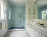 Bath Room, Engineered Quartz Counter, Undermount Sink, Ceramic Tile Floor, Glass Tile Wall, and Full Shower  Photos from Wellfleet Modern