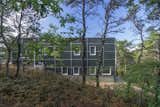 Exterior, House Building Type, Small Home Building Type, Green Siding Material, and Flat RoofLine  Search “6 homes done shades green” from Wellfleet Modern